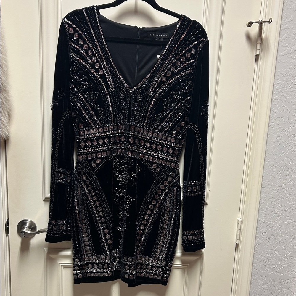 Endless Rose Black Dress with Silver Detailing. Size M new with tags.